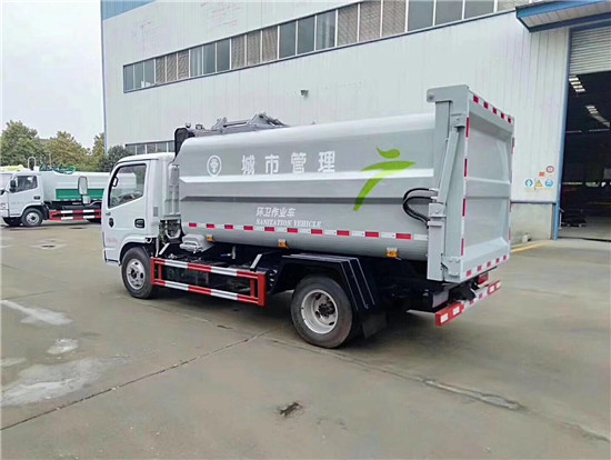 新款东风多利卡侧装压缩挂桶垃圾车